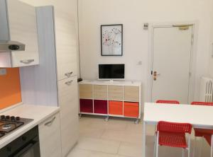A kitchen or kitchenette at Residence Hotel Vittoria