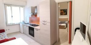 A kitchen or kitchenette at Residence Hotel Vittoria