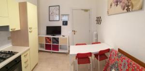 A kitchen or kitchenette at Residence Hotel Vittoria