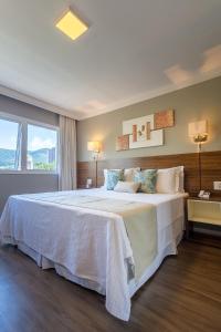 Cama ou camas em um quarto em Hotel Villa Fiori
