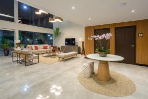Uma área de estar em Hotel Villa Fiori