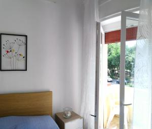 A bed or beds in a room at Residence Hotel Vittoria