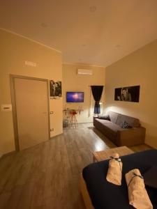 A bed or beds in a room at Artisti Bed&Dreams
