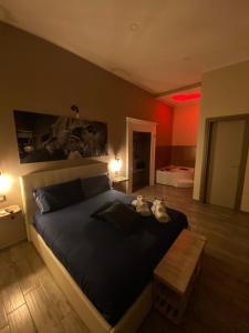 A bed or beds in a room at Artisti Bed&Dreams