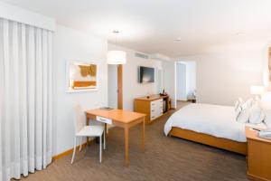 Rúm í herbergi á Hotel Melia Lima