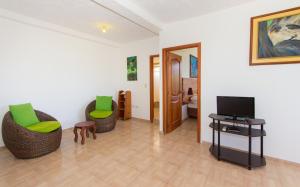 TV a/nebo společenská místnost v ubytování Hotel Twin Galápagos