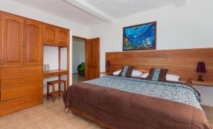 Postel nebo postele na pokoji v ubytování Hotel Twin Galápagos