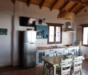 Kuchyň nebo kuchyňský kout v ubytování Casa Rural Los Santillos + 28 fotografií