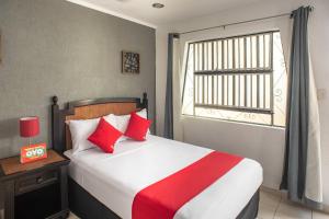 Llit o llits en una habitació de Hotel Dpas 52