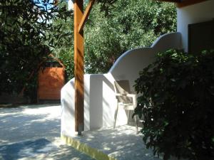 A garden outside Leros Eleonas Apartments