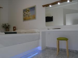 A television and/or entertainment centre at Leros Eleonas Apartments