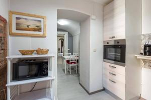 Kuchyň nebo kuchyňský kout v ubytování Two Rooms Bellini