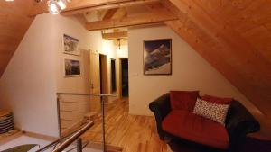 Posezení v ubytování VILA LESNA House with a garden 2 minutes from the center of the Tatras