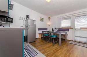 Kuchyň nebo kuchyňský kout v ubytování Apartment Diva