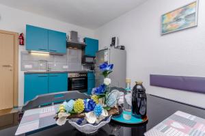 Kuchyň nebo kuchyňský kout v ubytování Apartment Diva