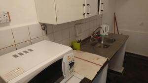 Kuhinja oz. manjša kuhinja v nastanitvi Apartamentos Quintana