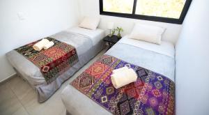 Postel nebo postele na pokoji v ubytování BOHOSTEL
