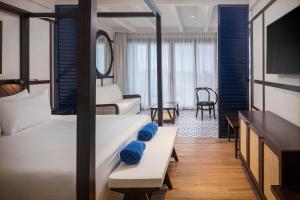Llit o llits en una habitació de Ocean Coral Spring Resort - All Inclusive