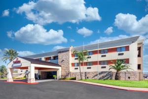 a rendering of the front of a hotel at Ramada by Wyndham Houston Intercontinental Airport South in Houston