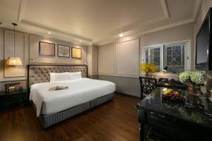 Ένα ή περισσότερα κρεβάτια σε δωμάτιο στο Imperial Hotel & Spa