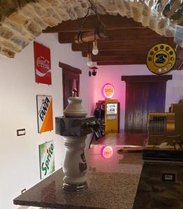 a camera in a room with signs on the wall at IL SANTO GRAAL in Triora