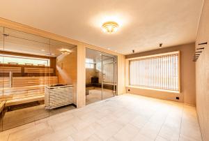Postel nebo postele na pokoji v ubytování BOUTIQUEHOTEL das edelweiss