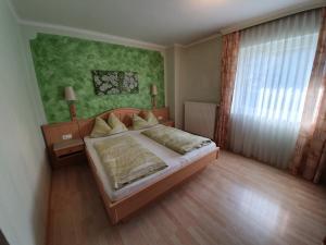 Voodi või voodid majutusasutuse Gasthof Hotel Zur Post toas