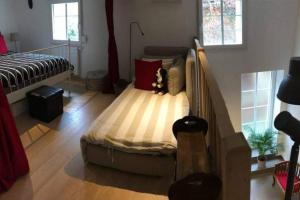 Ένα ή περισσότερα κρεβάτια σε δωμάτιο στο Esprit Loft +8 φωτογραφίες