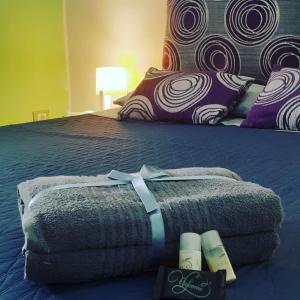 Postel nebo postele na pokoji v ubytování O'Paisi Casa Vacanze