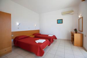Posteľ alebo postele v izbe v ubytovaní Moscha Hotel