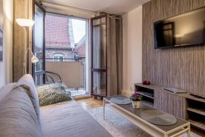 Televízia a/alebo spoločenská miestnosť v ubytovaní Grelewicz Apartments-MyPlace