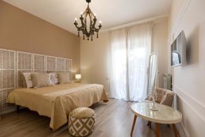 Postel nebo postele na pokoji v ubytování Twins House Sorrento