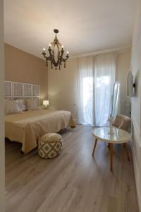 Postel nebo postele na pokoji v ubytování Twins House Sorrento
