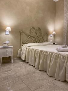 Postel nebo postele na pokoji v ubytování Boutique Hotel Calais Milano