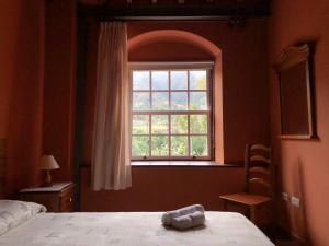 Postel nebo postele na pokoji v ubytování Casa Yanes Casas Rurales