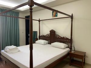 Ένα ή περισσότερα κρεβάτια σε δωμάτιο στο Art house Vasant Vihar New Delhi