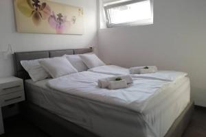 Postel nebo postele na pokoji v ubytování Dimitrios Loft Apartment