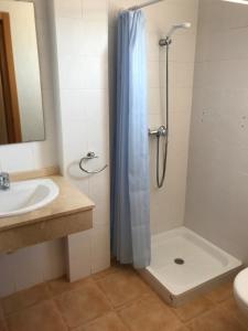 a bathroom with a shower and a sink at Miramar Marina de Marina Golf in Mojácar