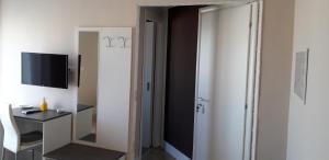 TV a/nebo společenská místnost v ubytování B&B I Tre Sensi