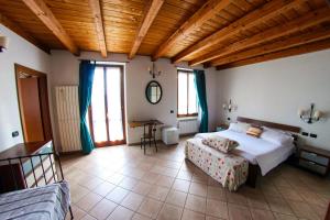 Ένα ή περισσότερα κρεβάτια σε δωμάτιο στο Villa Central Varenna
