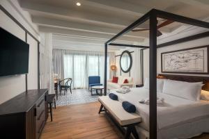Llit o llits en una habitació de Ocean Coral Spring Resort - All Inclusive