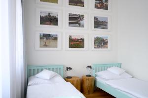 Posteľ alebo postele v izbe v ubytovaní Světoběžník Bed & Wine