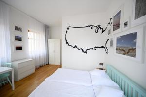 Posteľ alebo postele v izbe v ubytovaní Světoběžník Bed & Wine