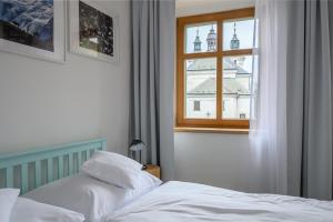 Posteľ alebo postele v izbe v ubytovaní Světoběžník Bed & Wine