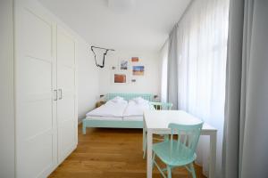 Posteľ alebo postele v izbe v ubytovaní Světoběžník Bed & Wine