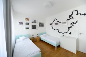 Posteľ alebo postele v izbe v ubytovaní Světoběžník Bed & Wine