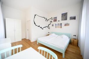 Posteľ alebo postele v izbe v ubytovaní Světoběžník Bed & Wine