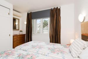 Posteľ alebo postele v izbe v ubytovaní Apartamento Silver + 37 fotografií