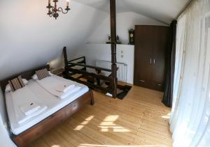 מיטה או מיטות בחדר ב-Casa Veche