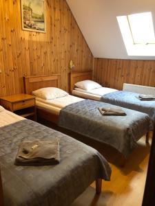 Postel nebo postele na pokoji v ubytování Viesu nams Vālodzes
